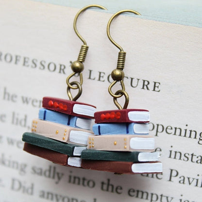 Boucles d'oreilles pile de livres