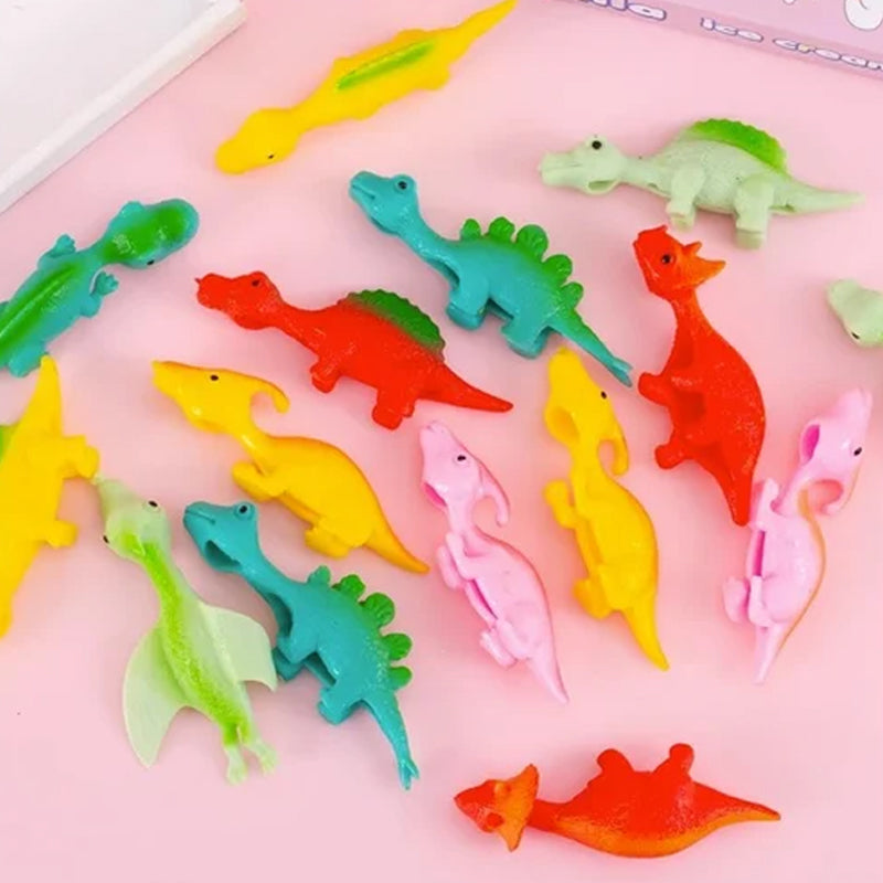 Jouets de doigt de dinosaure de fronde